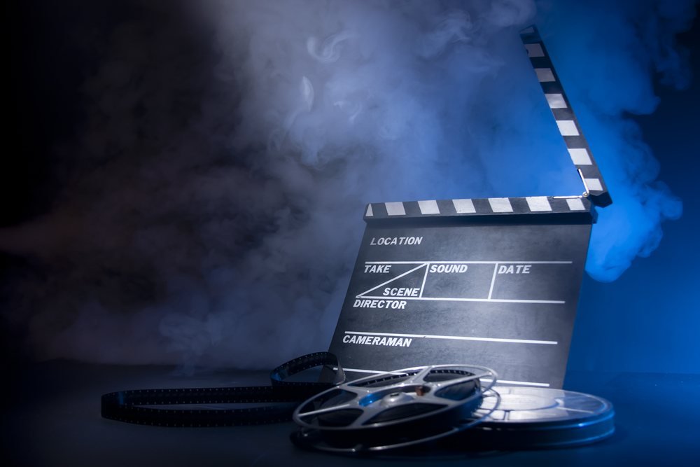 Clapperboard and film reel